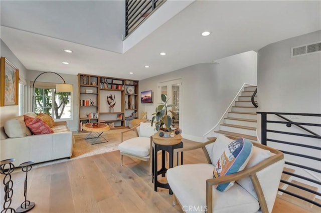19325 Peachtree Ln, Huntington Beach, CA 92648 - living area with recessed lighting, light wood-style flooring, and stairway