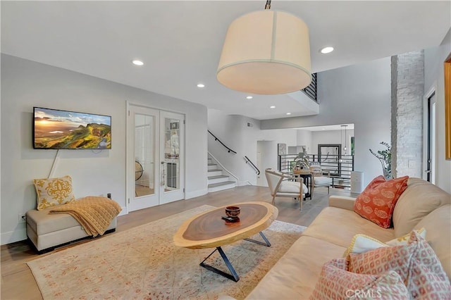 19325 Peachtree Ln, Huntington Beach, CA 92648 - living area featuring french doors, stairway, wood finished floors, and recessed lighting