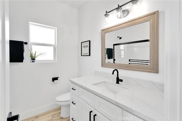 12207 Snapping Turtle Rd, Apple Valley, CA 92308 - bathroom featuring vanity and wood finished floors