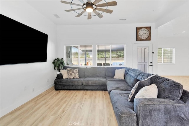 12207 Snapping Turtle Rd, Apple Valley, CA 92308 - living area with ceiling fan and light wood-style flooring