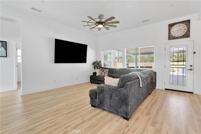 12207 Snapping Turtle Rd, Apple Valley, CA 92308 - living room featuring light wood-style floors and a ceiling fan