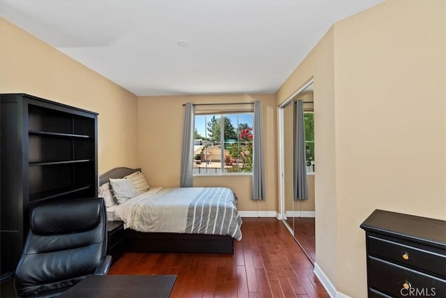 16858 Mariposa Ave, Riverside, CA 92504 - bedroom with dark wood-style flooring and baseboards