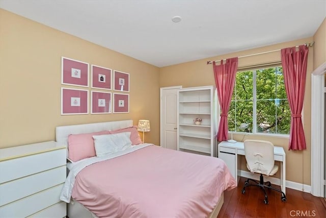 16858 Mariposa Ave, Riverside, CA 92504 - bedroom with hardwood / wood-style floors and baseboards