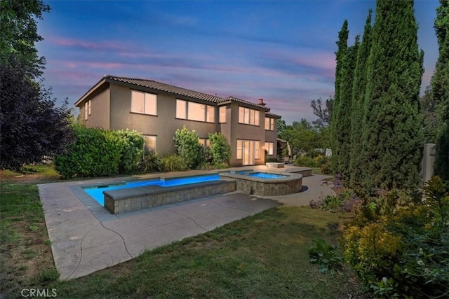 16858 Mariposa Ave, Riverside, CA 92504 - outdoor pool featuring an in-ground hot tub, a patio area, and a yard
