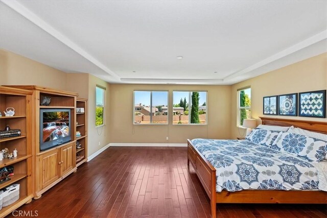 16858 Mariposa Ave, Riverside, CA 92504 - bedroom featuring dark wood-type flooring and baseboards