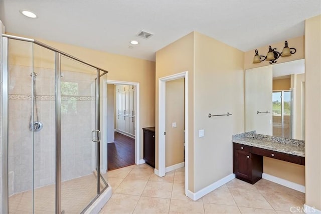 16858 Mariposa Ave, Riverside, CA 92504 - bathroom with vanity, a stall shower, tile patterned flooring, and recessed lighting