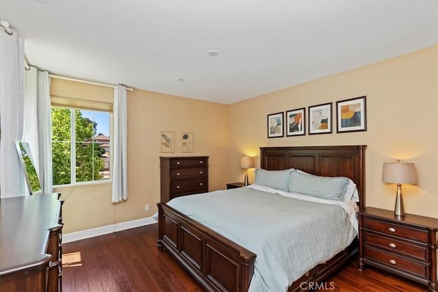 16858 Mariposa Ave, Riverside, CA 92504 - bedroom with dark wood-style floors