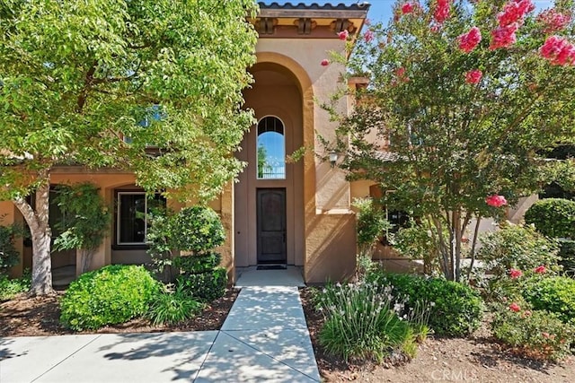 16858 Mariposa Ave, Riverside, CA 92504 - property entrance with stucco siding
