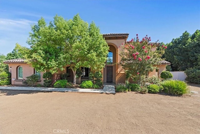 16858 Mariposa Ave, Riverside, CA 92504 - mediterranean / spanish house featuring a tiled roof and stucco siding