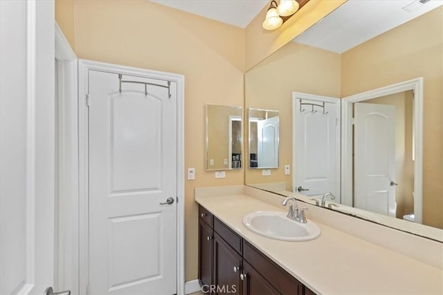 16858 Mariposa Ave, Riverside, CA 92504 - bathroom with vanity and toilet
