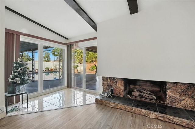 2007 Socrates Ave, Simi Valley, CA 93065 - unfurnished living room featuring wood finished floors and a stone fireplace