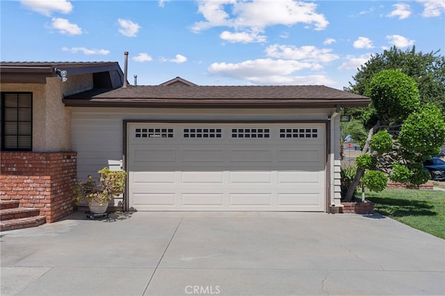 8038 Cyclamen Way, Buena Park, CA 90620 - garage featuring concrete driveway