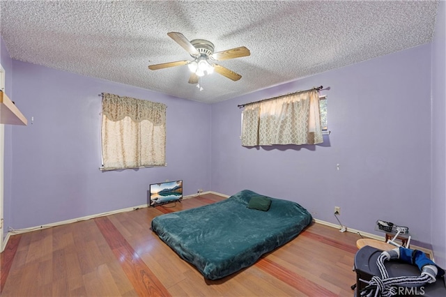 8038 Cyclamen Way, Buena Park, CA 90620 - bedroom with wood finished floors, a textured ceiling, and ceiling fan