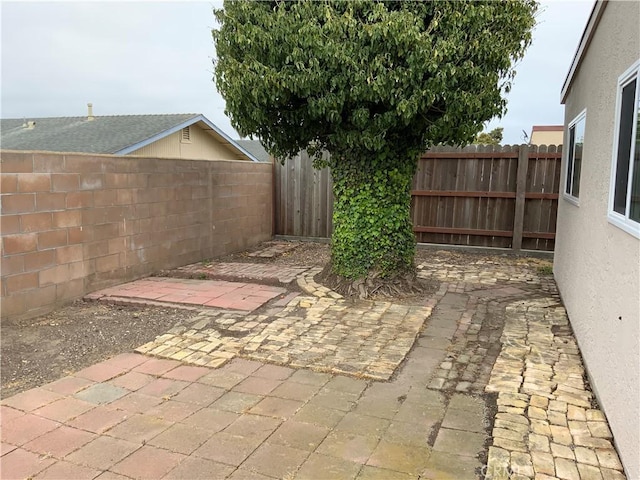 4839 Sanchez Dr, Guadalupe, CA 93434 - fenced backyard featuring a patio area