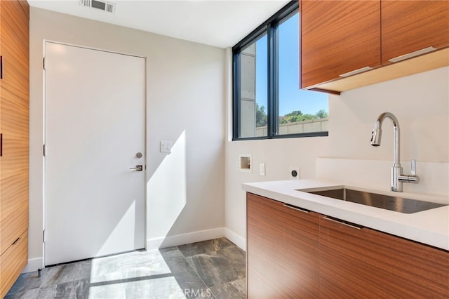 1922 Edgefair Ln, Redlands, CA 92373 - kitchen featuring brown cabinetry, modern cabinets, and light countertops