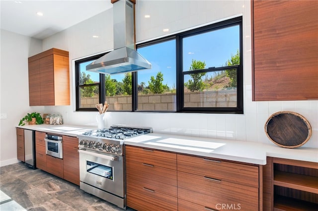 1922 Edgefair Ln, Redlands, CA 92373 - kitchen with island exhaust hood, modern cabinets, appliances with stainless steel finishes, and brown cabinets