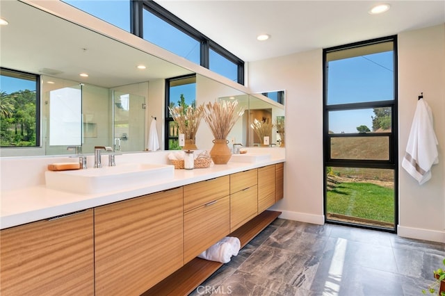 1922 Edgefair Ln, Redlands, CA 92373 - full bath with double vanity, healthy amount of natural light, a shower with shower door, and recessed lighting