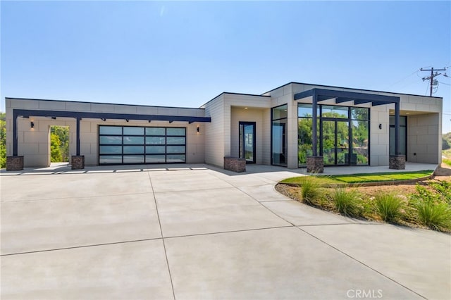 1922 Edgefair Ln, Redlands, CA 92373 - contemporary home with concrete driveway and a garage
