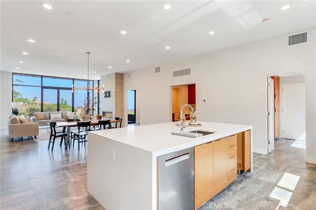 1922 Edgefair Ln, Redlands, CA 92373 - kitchen with modern cabinets, recessed lighting, a center island with sink, a chandelier, and light countertops