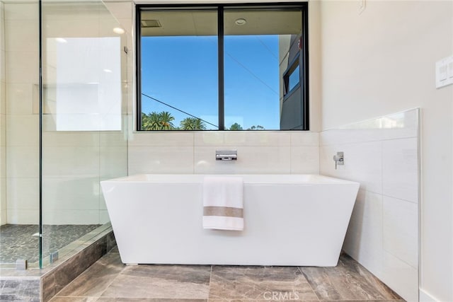 1922 Edgefair Ln, Redlands, CA 92373 - full bathroom featuring tile walls, a freestanding bath, and a tile shower