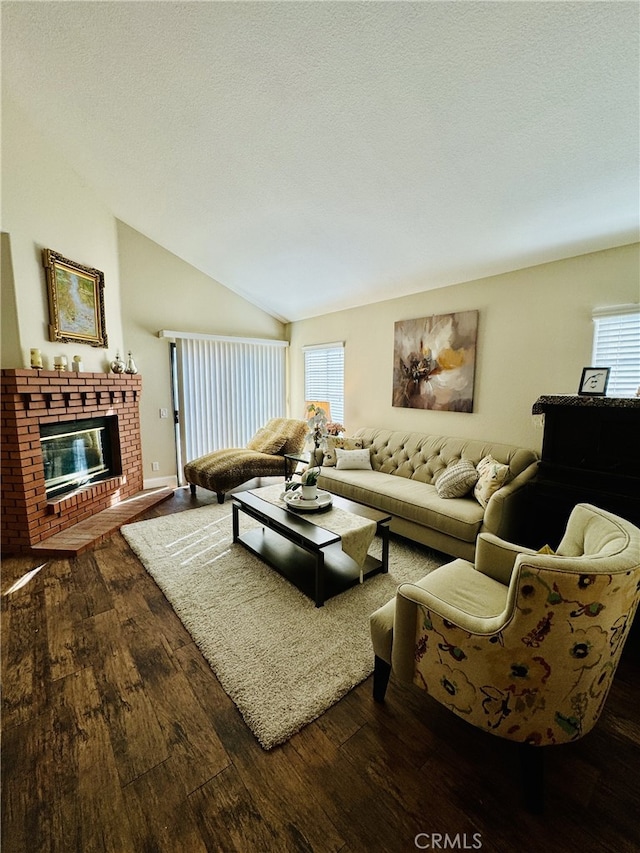 6159 Fleetwood Ln, Chino Hills, CA 91709 - living room with dark wood-type flooring, lofted ceiling, and a brick fireplace