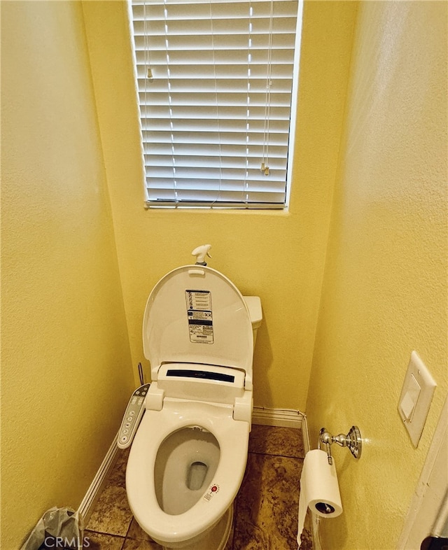 6159 Fleetwood Ln, Chino Hills, CA 91709 - bathroom view of baseboards and toilet