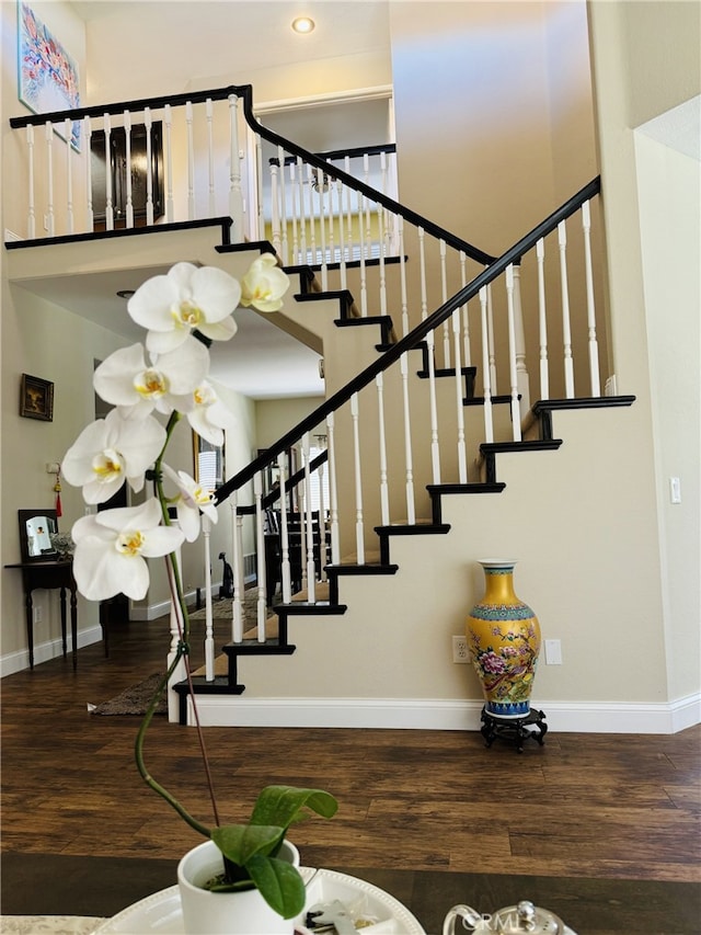 6159 Fleetwood Ln, Chino Hills, CA 91709 - stairway featuring wood finished floors and a towering ceiling