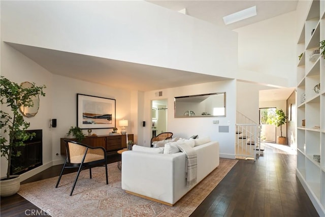 1830 N Alvarado St Unit 14, Los Angeles, CA 90026 - living room with hardwood / wood-style floors, stairs, and a skylight