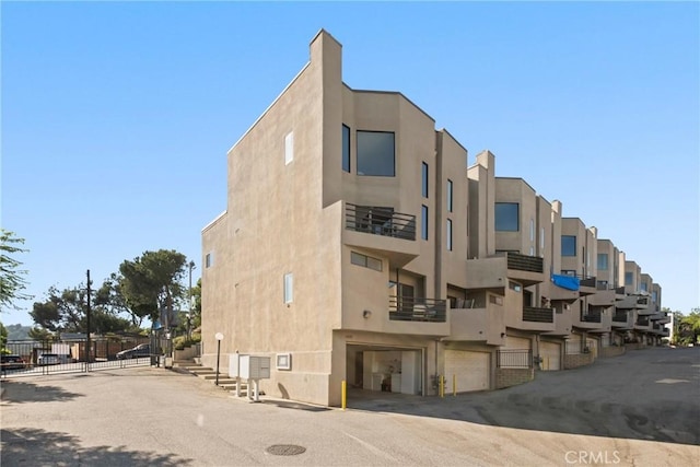 1830 N Alvarado St Unit 14, Los Angeles, CA 90026 - view of building exterior featuring an attached garage