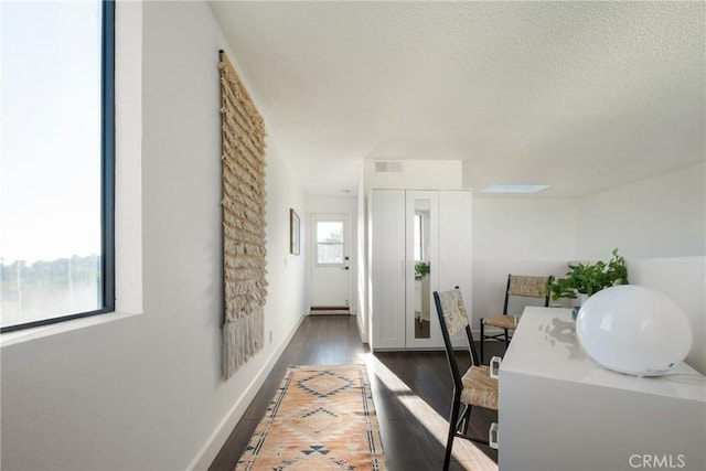 1830 N Alvarado St Unit 14, Los Angeles, CA 90026 - corridor with wood finished floors and a textured ceiling