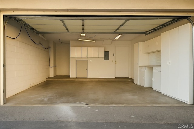 1830 N Alvarado St Unit 14, Los Angeles, CA 90026 - garage with electric panel and a garage door opener