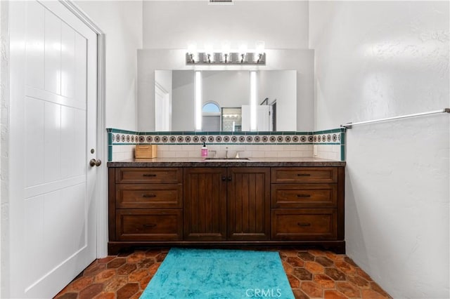 810 E Dalton Ave, Glendora, CA 91741 - bathroom with vanity and tasteful backsplash