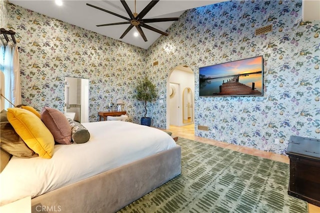 810 E Dalton Ave, Glendora, CA 91741 - bedroom with arched walkways, wallpapered walls, recessed lighting, and a ceiling fan