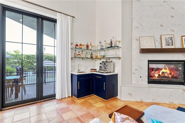 810 E Dalton Ave, Glendora, CA 91741 - indoor wet bar with light tile patterned floors, a premium fireplace, and french doors