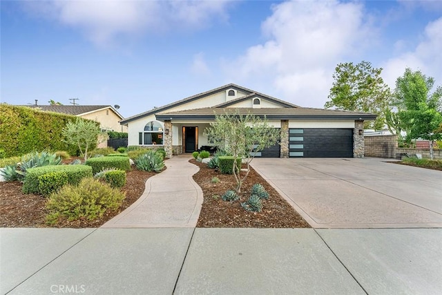 810 E Dalton Ave, Glendora, CA 91741 - view of front of property with driveway, an attached garage, stone siding, and stucco siding