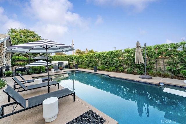 810 E Dalton Ave, Glendora, CA 91741 - view of swimming pool featuring a fenced backyard, a patio area, and a diving board