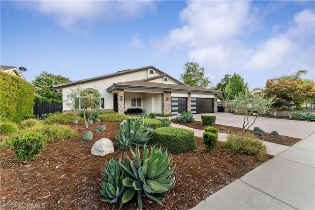 810 E Dalton Ave, Glendora, CA 91741 - view of front of home featuring stucco siding, stone siding, driveway, and an attached garage