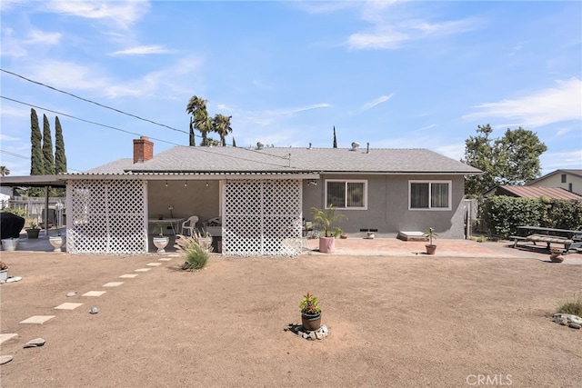 7219 Font Ave, Jurupa Valley, CA 92509 - back of house featuring a patio area and stucco siding