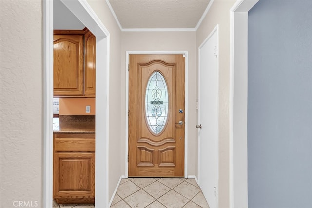 7219 Font Ave, Jurupa Valley, CA 92509 - entrance foyer featuring ornamental molding, light tile patterned floors, and a textured ceiling