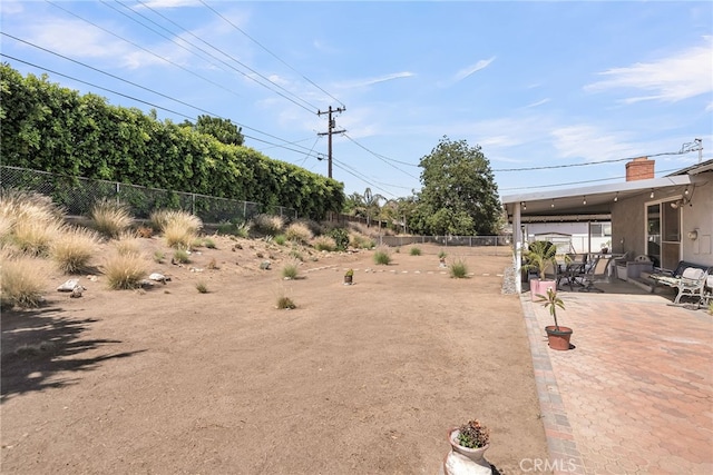 7219 Font Ave, Jurupa Valley, CA 92509 - fenced backyard with a patio area