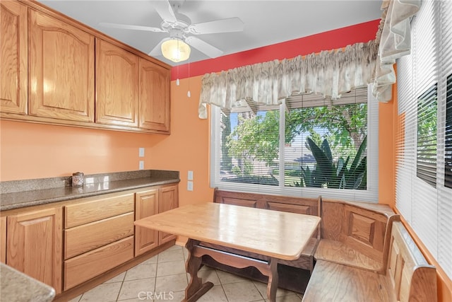 7219 Font Ave, Jurupa Valley, CA 92509 - kitchen featuring light tile patterned floors and breakfast area