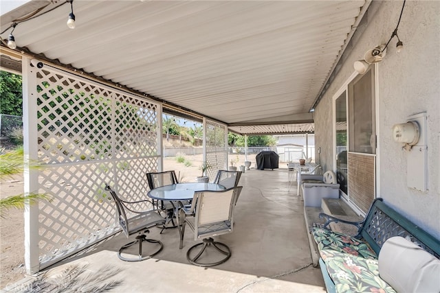 7219 Font Ave, Jurupa Valley, CA 92509 - fenced backyard featuring a patio, outdoor dining space, and area for grilling