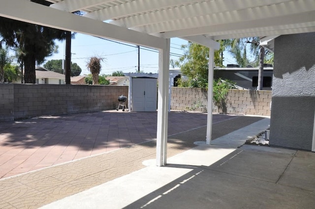 3629 Puente Ave, Baldwin Park, CA 91706 - fenced backyard featuring a storage shed and a patio area