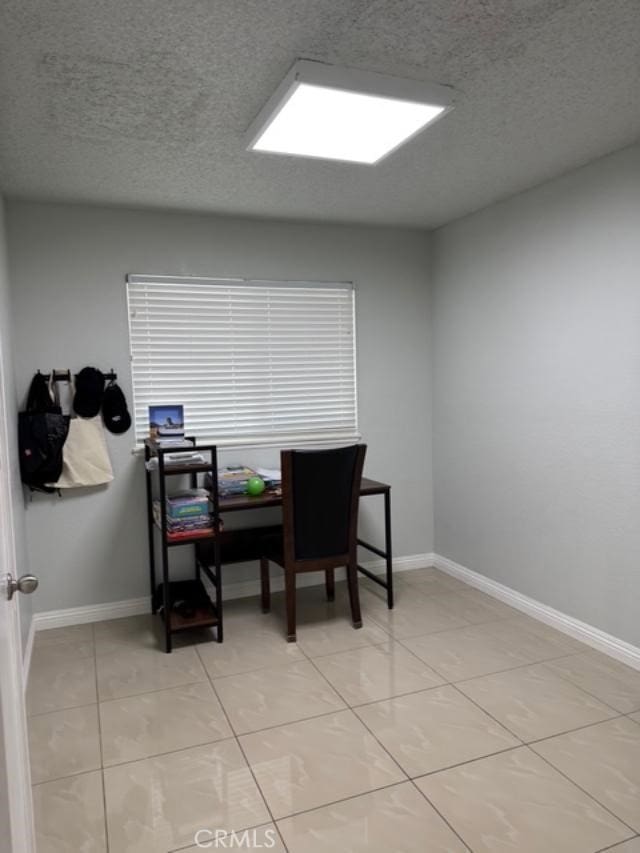 3629 Puente Ave, Baldwin Park, CA 91706 - office area with a textured ceiling and light tile patterned flooring