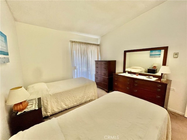 1660 Northwood Rd Unit M11-276D, Seal Beach, CA 90740 - bedroom featuring light colored carpet and lofted ceiling