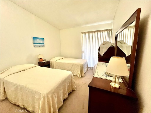 1660 Northwood Rd Unit M11-276D, Seal Beach, CA 90740 - bedroom with light colored carpet and lofted ceiling