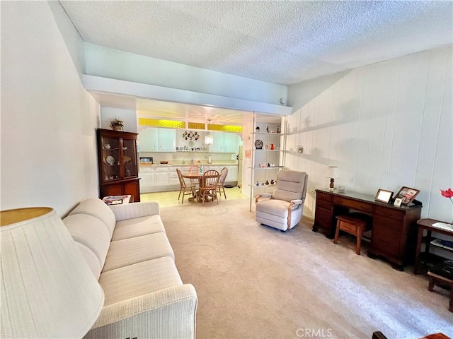 1660 Northwood Rd Unit M11-276D, Seal Beach, CA 90740 - living area with light colored carpet and a textured ceiling