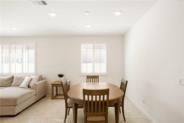 11624 Sky Pointe Dr, Desert Hot Springs, CA 92240 - dining room with healthy amount of natural light, recessed lighting, and light tile patterned floors