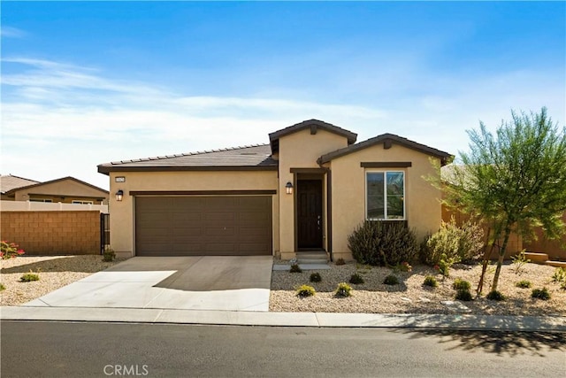 11624 Sky Pointe Dr, Desert Hot Springs, CA 92240 - single story home featuring an attached garage, stucco siding, concrete driveway, and a tile roof