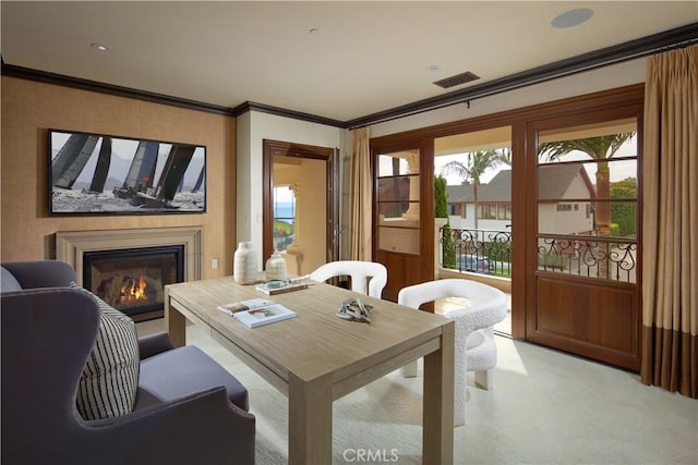 3300 Ocean Blvd, Corona Del Mar, CA 92625 - dining area featuring healthy amount of natural light, a glass covered fireplace, light carpet, and crown molding
